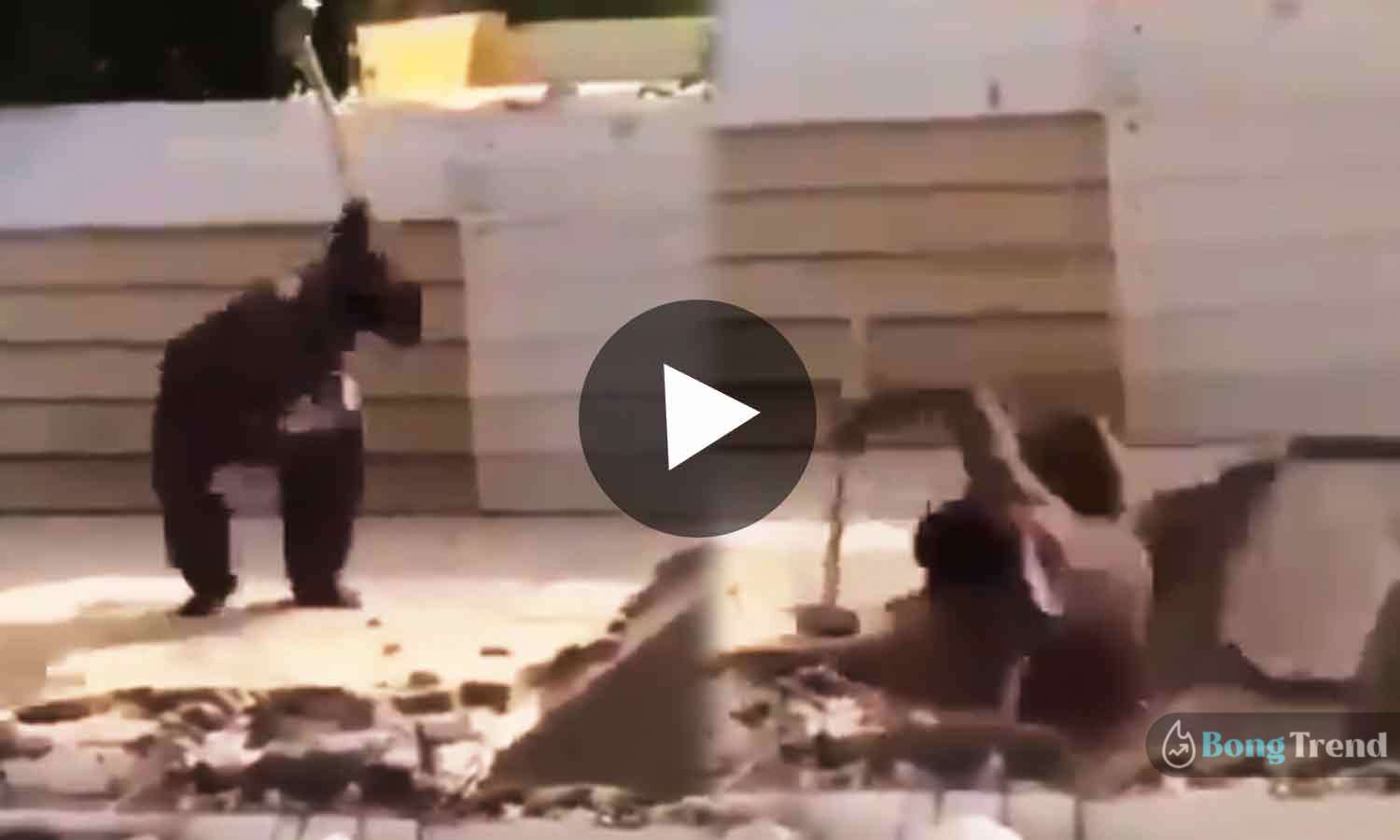 ভাইরাল ভিডিও Viral Video Man falls from roof while hammering