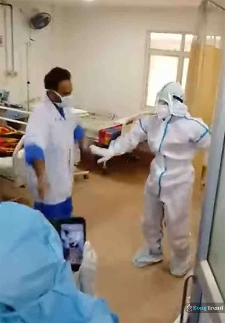 Nurse dancing in PPE Kit