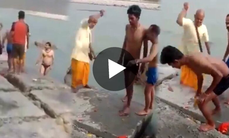Sannyasi beats up boys drinking in ganga river viral video