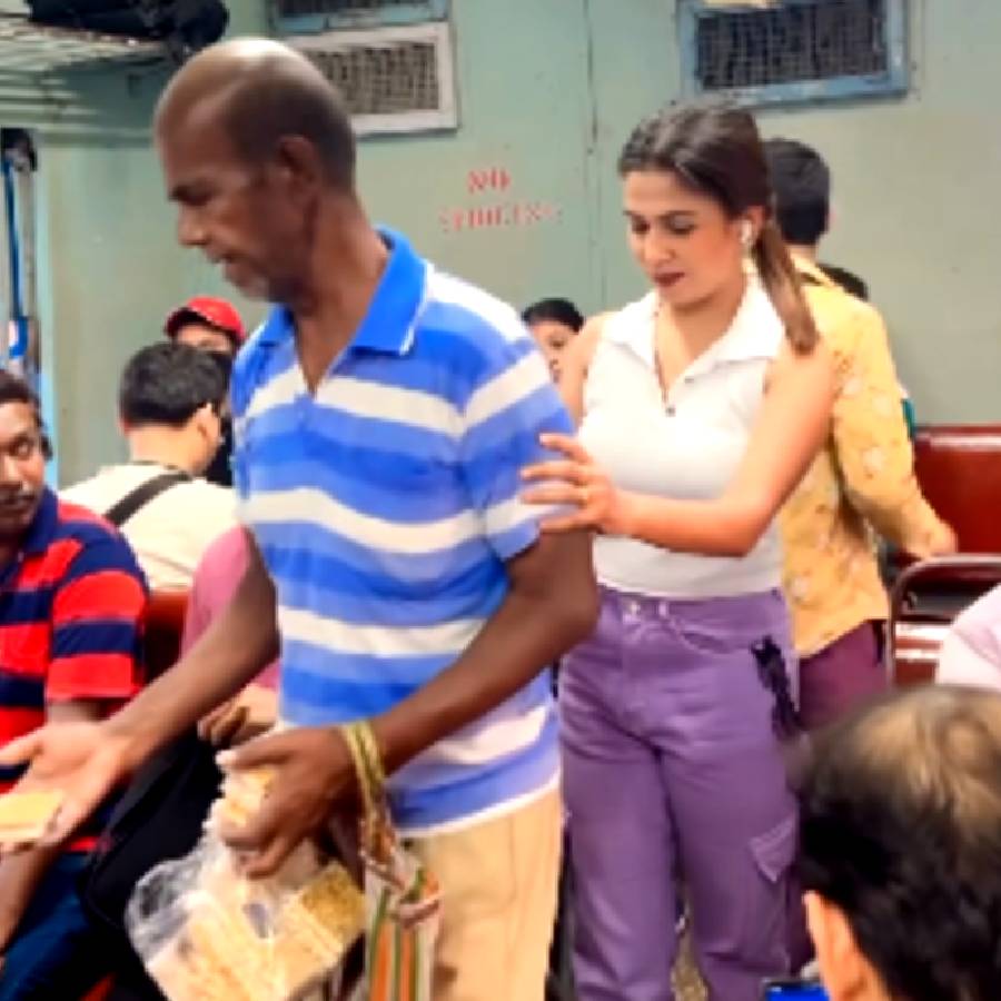 Young girl dances in train, Young girl pushes old hawker